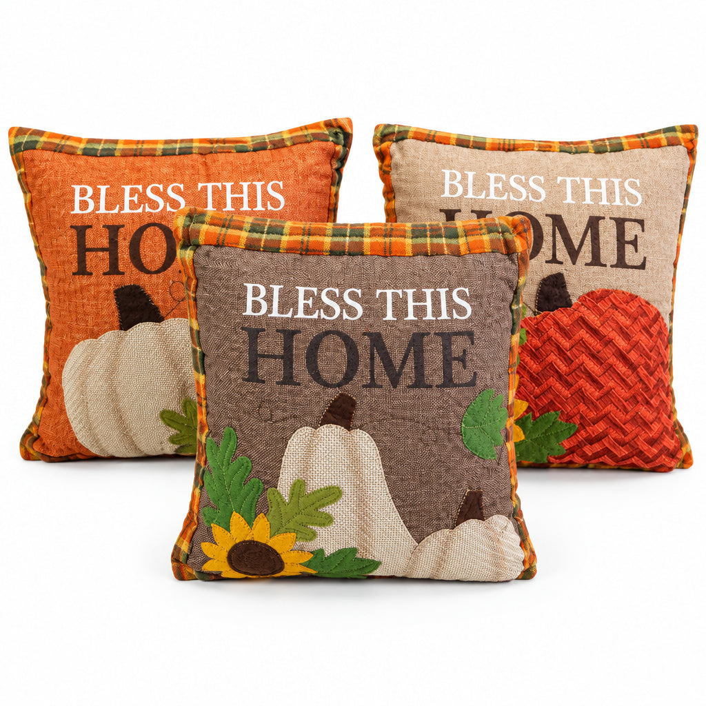 Τρία φθινοπωρινά μαξιλάρια Bless This Home σε πορτοκαλί, καφέ και μπεζ linen χρώμα με κολοκύθες και ηλίανθους σε λευκό φόντο - VassoHome